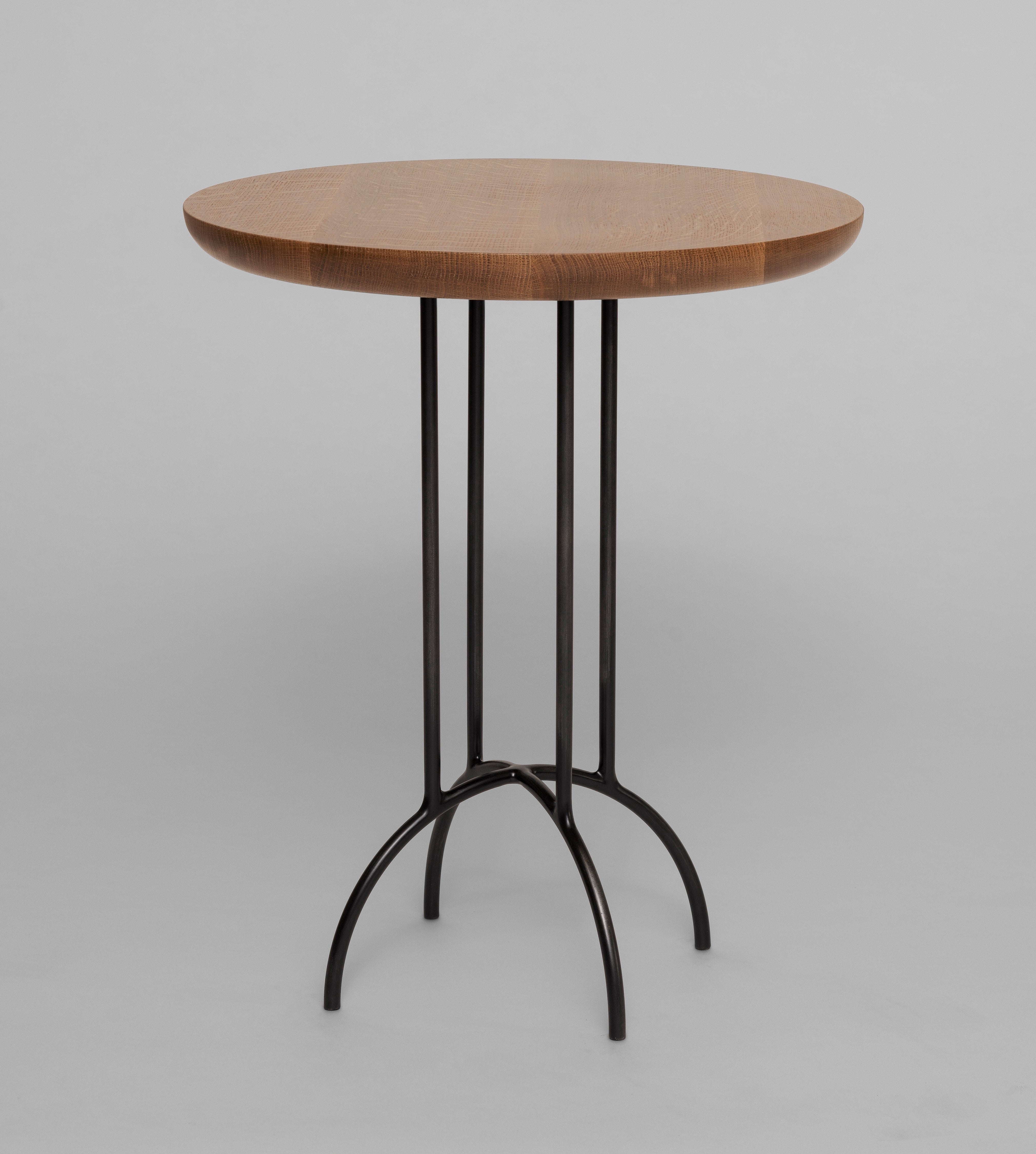 Martini Table Shown in white oak with natural finish and Midnight metal finish