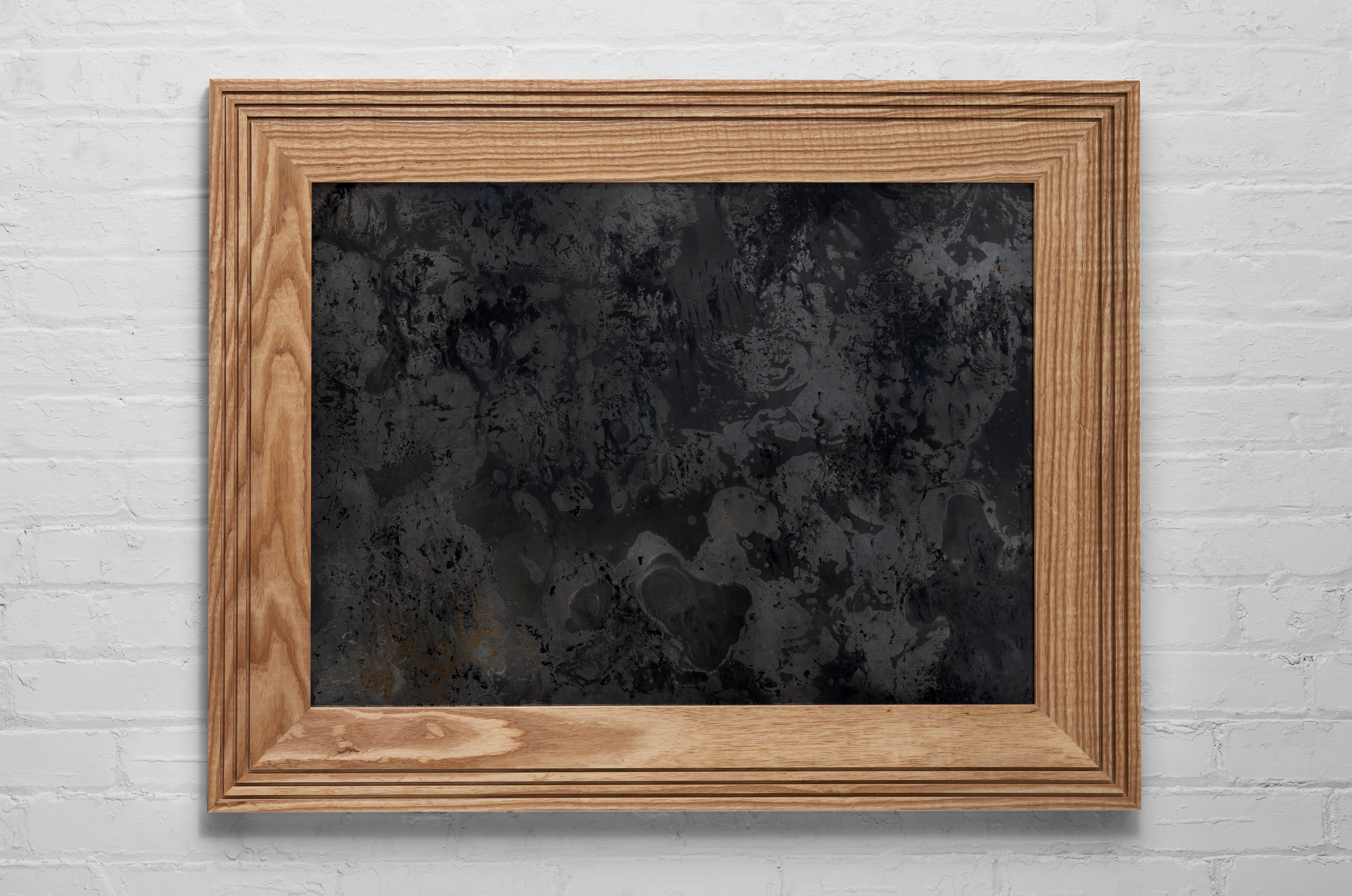 Notches Frame Shown in white oak with natural finish and Pluto mirror finish